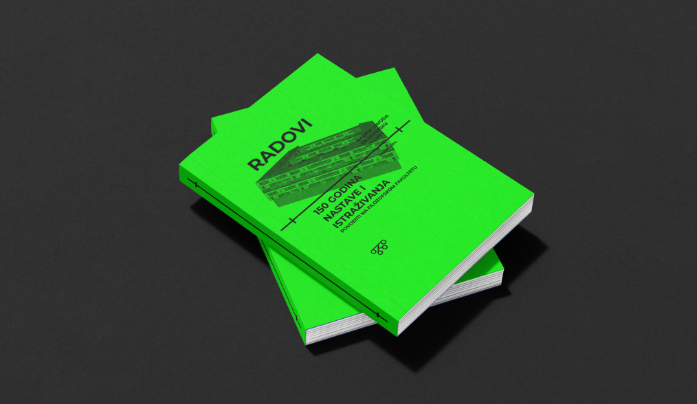 Stack of bright green publications on a dark background