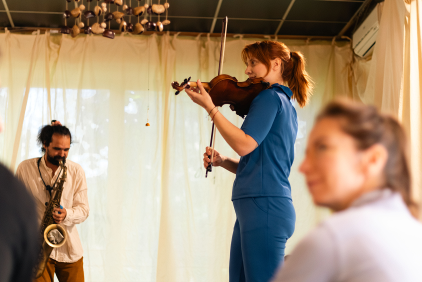 Violinist performing during a festival programme