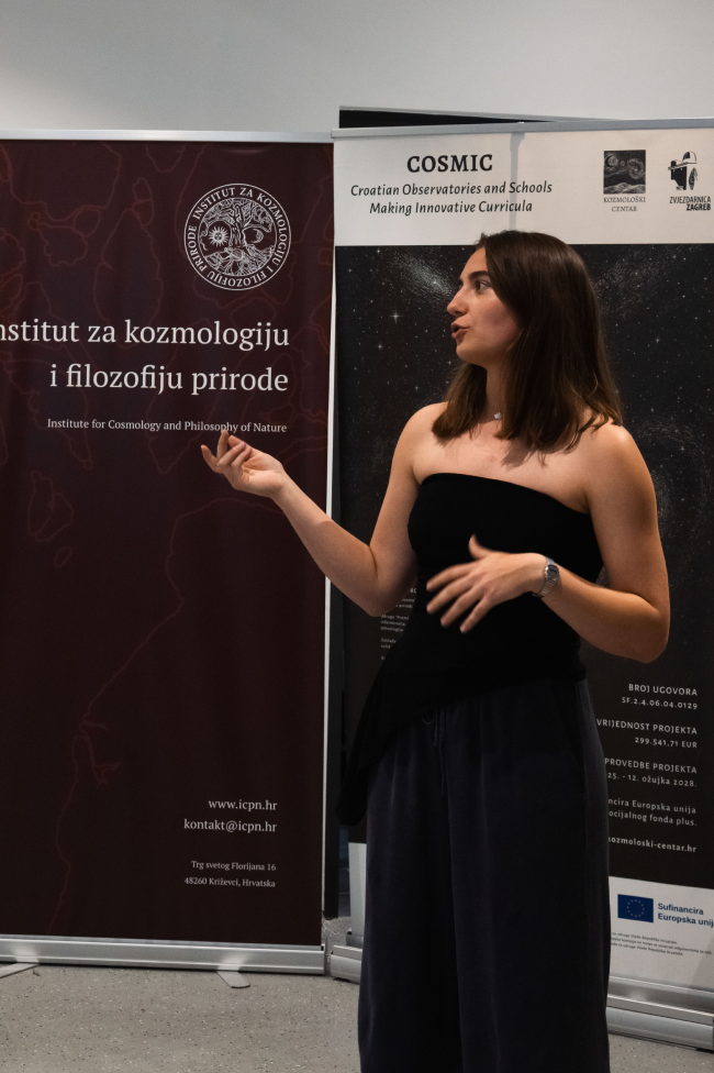 Artist speaking during the Varijacije exhibition opening